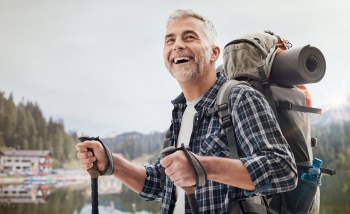 Happy man hiking.